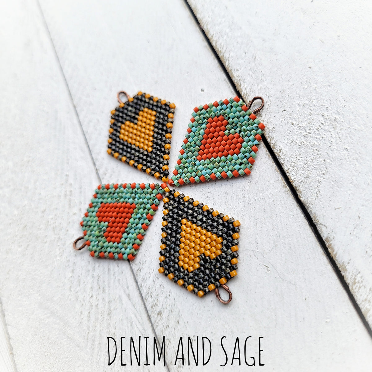 Black picasso and hawthorne heart beaded earrings